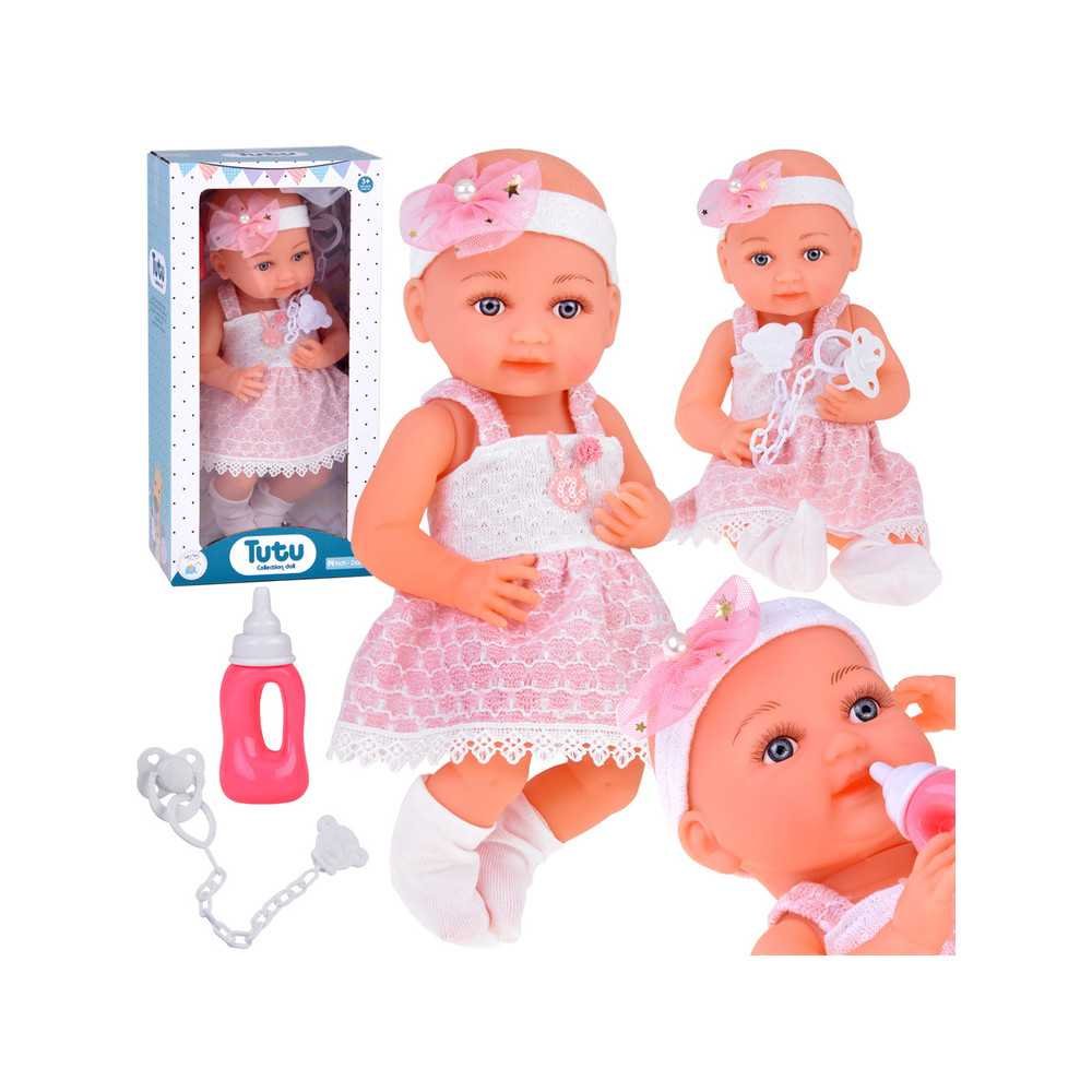 Rubber baby doll in a pink dress, bottle, pacifier ZA5235