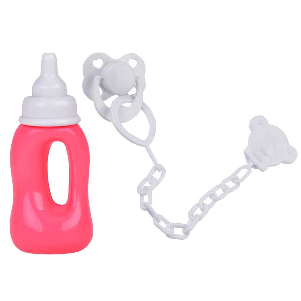 Rubber baby doll in a pink dress, bottle, pacifier ZA5235