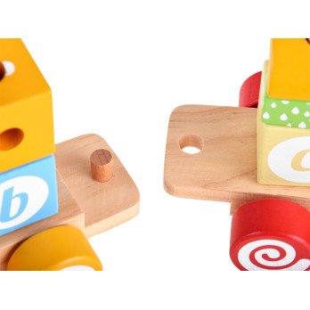 A queue of wooden blocks with letters, numbers ZA4116